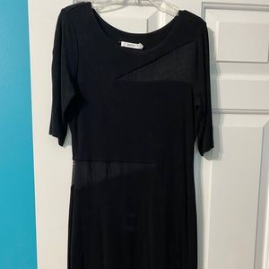 Black dress with two mesh cutouts